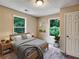 Cozy bedroom featuring natural light, neutral colors, and a comfortable bed for restful nights at 1625 Orlando Sw St, Atlanta, GA 30311