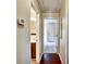 Hallway with views of the bathroom and a bedroom, offering a glimpse of the home's layout at 1625 Orlando Sw St, Atlanta, GA 30311