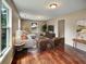 Bright living room with hardwood floors, a comfortable sofa, and windows offering pleasant views at 1625 Orlando Sw St, Atlanta, GA 30311