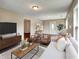 Comfortable living room with a cozy seating arrangement, complemented by stylish decor and ample lighting at 1625 Orlando Sw St, Atlanta, GA 30311
