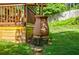 Backyard garden with rainwater collection system near deck at 407 Doris Dr, Woodstock, GA 30188