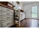 Updated kitchen with custom cabinetry, pull out spice rack, and granite countertops at 407 Doris Dr, Woodstock, GA 30188