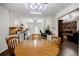 Open concept kitchen featuring an adjacent dining area and an eat-in kitchen at 407 Doris Dr, Woodstock, GA 30188
