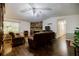 Inviting living room with a stone fireplace and comfortable seating, perfect for relaxation and Gathering time at 407 Doris Dr, Woodstock, GA 30188