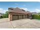 Spacious three-car garage and extra parking space is perfect for car enthusiasts and/or storage at 3410 Enclave Mill Ct, Dacula, GA 30019