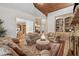 Cozy living room features a decorative rug, wood floors, and elegant built-in shelving at 3410 Enclave Mill Ct, Dacula, GA 30019