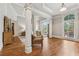 Expansive main bedroom with hardwood floors, tray ceilings, and large windows at 3410 Enclave Mill Ct, Dacula, GA 30019