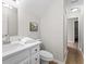 Bathroom with white vanity, ample storage, natural light, and modern fixtures at 103 Seabolt Dr, Locust Grove, GA 30248
