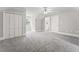 Bedroom with carpet, a double closet, natural light, and neutral decor at 103 Seabolt Dr, Locust Grove, GA 30248