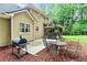 Backyard of home featuring patio, outdoor seating, grill, and basketball hoop at 135 Crimson Rdg, Tyrone, GA 30290