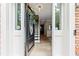 Open front door view with hardwood flooring and access to the staircase at 135 Crimson Rdg, Tyrone, GA 30290