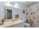Bathroom featuring a vanity, mirror, toilet, and shower with a floral curtain at 1738 Sherry Ln, Jonesboro, GA 30236