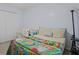 Bedroom with a panda patterned quilt, crib, and nearby closet at 1738 Sherry Ln, Jonesboro, GA 30236