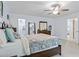 Bright bedroom with ceiling fan, carpet, walk-in closet and traditional furnishings at 1738 Sherry Ln, Jonesboro, GA 30236