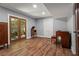 Versatile basement space with hardwood floors, French doors to the outside, and ample room for activities at 970 Pine Grove Pointe Dr, Roswell, GA 30075