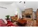 Comfortable living room featuring stone fireplace and vaulted ceiling at 970 Pine Grove Pointe Dr, Roswell, GA 30075