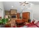 Cozy living room features a stone fireplace and hardwood floors at 970 Pine Grove Pointe Dr, Roswell, GA 30075
