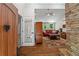 Inviting living room with hardwood floors and a cozy stone fireplace at 970 Pine Grove Pointe Dr, Roswell, GA 30075