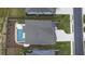Aerial view of home featuring pool, patio, fenced yard, and landscaping at 244 Citrine Way, Acworth, GA 30101