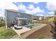 Spacious backyard featuring a pool, patio, outdoor seating, and well-maintained landscaping at 244 Citrine Way, Acworth, GA 30101