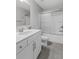 Clean bathroom with a white vanity, silver hardware, a toilet, and a shower with sliding glass doors at 244 Citrine Way, Acworth, GA 30101