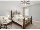 Cozy bedroom with detailed wood bed frame and complementing furniture at 244 Citrine Way, Acworth, GA 30101