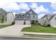 Two-story home with a manicured lawn, a two-car garage, and welcoming curb appeal at 244 Citrine Way, Acworth, GA 30101