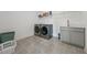 Spacious laundry room featuring modern stainless steel washer and dryer and ample storage at 7420 Wild Violet Dr, Cumming, GA 30040