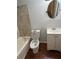 Bathroom with a tub and single vanity at 10630 Worthington Hills Mnr, Roswell, GA 30076