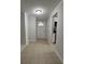 Entryway with tiled floor and a view of the kitchen at 10630 Worthington Hills Mnr, Roswell, GA 30076