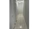 Hallway with white doors and neutral colored walls at 10630 Worthington Hills Mnr, Roswell, GA 30076