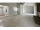Spacious living room with tile floors and a ceiling fan at 10630 Worthington Hills Mnr, Roswell, GA 30076