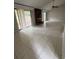 Spacious living room with tile floors and a cozy fireplace feature at 10630 Worthington Hills Mnr, Roswell, GA 30076