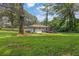 Lush backyard with mature trees, perfect for enjoying nature and outdoor activities at 1769 W Austin Rd, Decatur, GA 30032