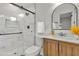 Modern bathroom with a glass-enclosed shower, sleek vanity, and stylish fixtures at 1769 W Austin Rd, Decatur, GA 30032
