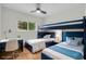 Charming bedroom with a bunkbed, desk, and a big window letting in plenty of natural light at 1769 W Austin Rd, Decatur, GA 30032