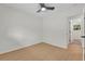 Bright bedroom featuring hardwood floors, a ceiling fan, and neutral paint at 1769 W Austin Rd, Decatur, GA 30032