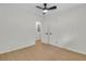 Bright bedroom featuring hardwood floors, a ceiling fan, and neutral paint at 1769 W Austin Rd, Decatur, GA 30032