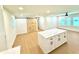 Spacious bonus room with an island and barn door at 1769 W Austin Rd, Decatur, GA 30032