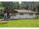 Charming, newly renovated one-story home with a welcoming front porch and landscaped yard at 1769 W Austin Rd, Decatur, GA 30032