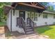Inviting front porch with craftsman details, freshly painted in neutral tones at 1769 W Austin Rd, Decatur, GA 30032