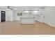 Kitchen featuring white cabinets, stainless appliances, and a breakfast bar at 1769 W Austin Rd, Decatur, GA 30032