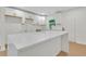 Kitchen with modern appliances, ample storage, and a large quartz countertop island at 1769 W Austin Rd, Decatur, GA 30032