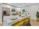 Bright, modern kitchen with white cabinets, stainless steel appliances, and a large center island at 1769 W Austin Rd, Decatur, GA 30032