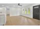 Open-concept living room with wood flooring, plenty of natural light, and a minimalist design at 1769 W Austin Rd, Decatur, GA 30032