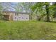 The home features a spacious backyard, deck and stair access at 2128 Kimberly Rd, Atlanta, GA 30331