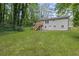 The property includes a large lawn and deck with stair access at 2128 Kimberly Rd, Atlanta, GA 30331