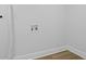 A well-lit laundry room features washer and dryer hookups at 2128 Kimberly Rd, Atlanta, GA 30331