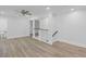 Open area showing modern railing, high ceilings, neutral paint, and plenty of natural light at 2128 Kimberly Rd, Atlanta, GA 30331
