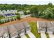 Aerial shot of a suburban neighborhood with tree-lined streets and well-maintained lawns at 2629 Irwell Way, Lawrenceville, GA 30044